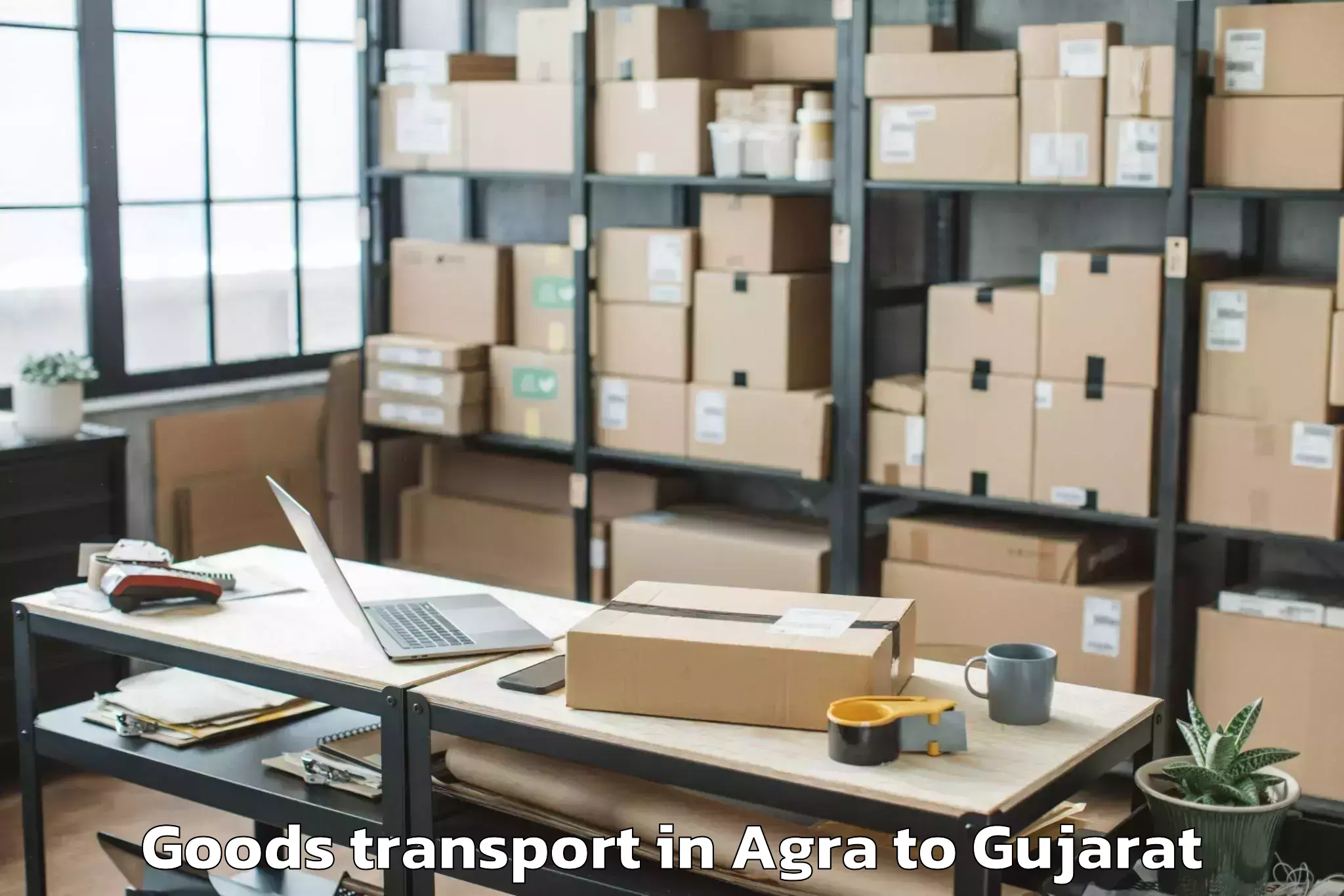 Hassle-Free Agra to Veer Narmad South Gujarat Univ Goods Transport